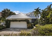 Exterior front - Single Family Home for sale at 122 Carrick Bend Ln, Boca Grande, FL 33921 - MLS Number is D6122010