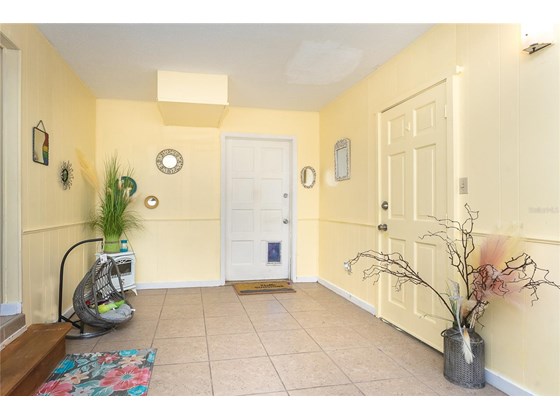 Entrance for Lower Unit - Duplex/Triplex for sale at 4076 N Beach Rd #10 & 11, Englewood, FL 34223 - MLS Number is D6122744