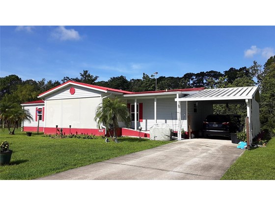 Front Exterior - Manufactured Home for sale at 1413 Schult Ct, Tavares, FL 32778 - MLS Number is G5045004