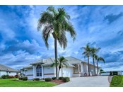 Single Family Home for sale at 12586 Bacchus Rd, Port Charlotte, FL 33981 - MLS Number is W7839926