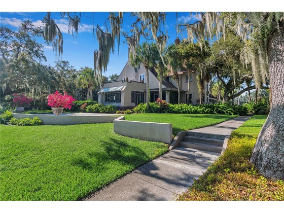 The grounds charm is undeniable. - Single Family Home for sale at 5030 Sunrise Dr S, St Petersburg, FL 33705 - MLS Number is U8146766