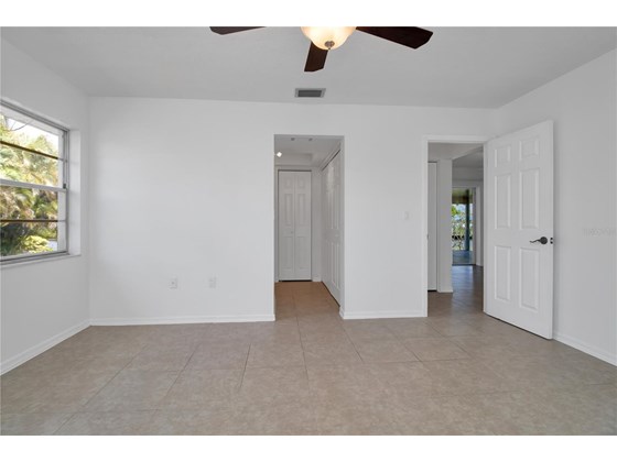 Primary Bedroom - Single Family Home for sale at 120 Sinclair St Sw, Port Charlotte, FL 33952 - MLS Number is C7450500
