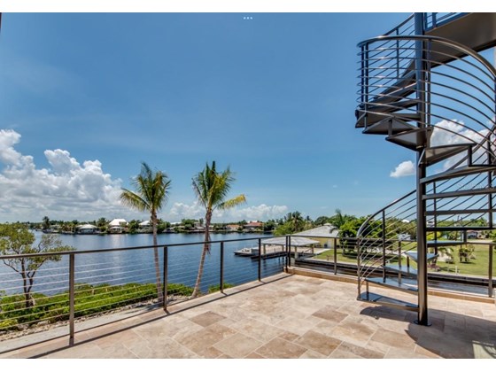 Spiral staircase to roof top deck - Single Family Home for sale at 2755 Cussell Dr, Saint James City, FL 33956 - MLS Number is C7451799