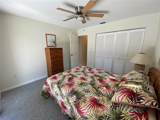 3rd bedroom. This room has sliding glass doors to access the lanai/pool area. - Single Family Home for sale at 18506 Hottelet Cir, Port Charlotte, FL 33948 - MLS Number is C7452138