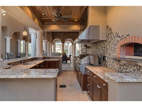 Custom Pizza Oven, Stainless Grill and River Pebble Backsplash - Single Family Home for sale at 8499 Lindrick Ln, Bradenton, FL 34202 - MLS Number is A4475594