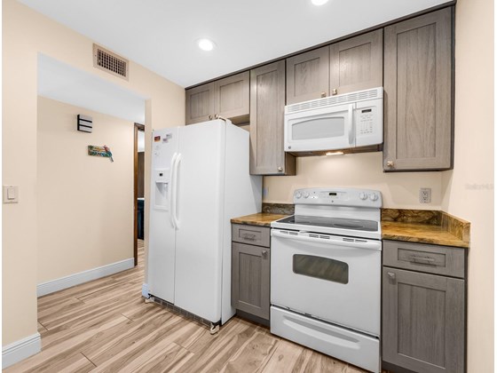 Professionally remodeled and re-designed  kitchen. - Condo for sale at 6810 Midnight Pass Rd, Sarasota, FL 34242 - MLS Number is A4507853