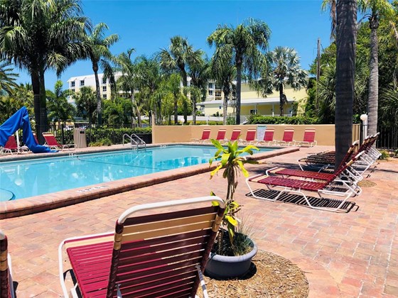 Sparking clean association pool. - Condo for sale at 6810 Midnight Pass Rd, Sarasota, FL 34242 - MLS Number is A4507853