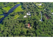 Private neighborhood with a lake for fishing - Single Family Home for sale at 7700 Iguana Dr, Sarasota, FL 34241 - MLS Number is A4512842