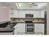 Kitchen - Condo for sale at 1055 W Peppertree Dr #501aa, Sarasota, FL 34242 - MLS Number is A4517324