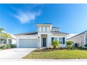 Front elevation - Single Family Home for sale at 13181 Steinhatchee Loop, Venice, FL 34293 - MLS Number is A4519994