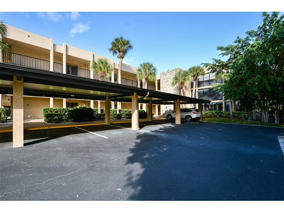 Parking Space 1, adjacent to B107 front door!  Just one curb/step for easy access! - Condo for sale at 450 Gulf Of Mexico Dr #B107, Longboat Key, FL 34228 - MLS Number is A4520786