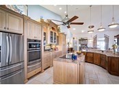 Large custom kitchen is very inviting and conveniently located near the dining room - Single Family Home for sale at 1012 Bayview Dr, Nokomis, FL 34275 - MLS Number is A4521028