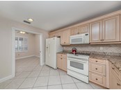 Kitchen to study/den - Condo for sale at 147 Tampa Ave E #702, Venice, FL 34285 - MLS Number is N6116949