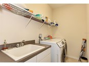 Indoor Laundry- New washer Dryer - Single Family Home for sale at 314 Lake Tahoe Ct, Englewood, FL 34223 - MLS Number is N6117592