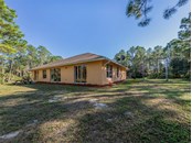 Rear exterior - Single Family Home for sale at 4700 Forbes Trl, Venice, FL 34292 - MLS Number is N6118561