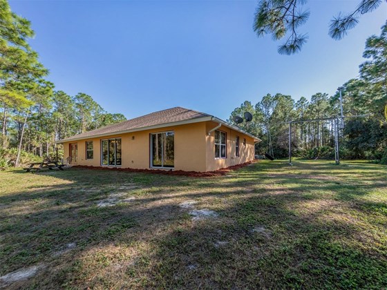 Rear exterior - Single Family Home for sale at 4700 Forbes Trl, Venice, FL 34292 - MLS Number is N6118561