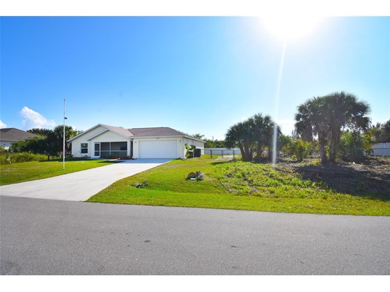 Single Family Home for sale at 15193 Lakeland Cir, Port Charlotte, FL 33981 - MLS Number is N6118811